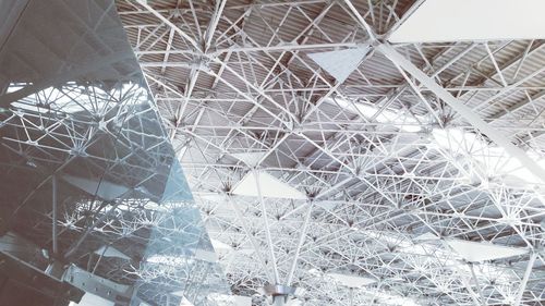 Low angle view of metallic roof at airport terminal