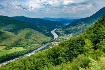 High angle view of landscape and mountains against sky