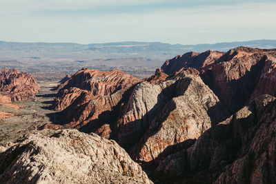 Panoramic view of rocks and mountains against sky