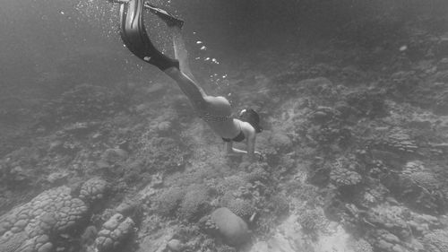 Man swimming in sea