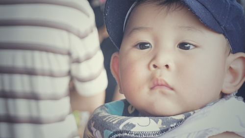 Portrait of cute baby girl at home
