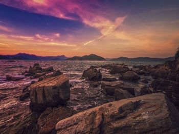 Scenic view of sea against sky during sunset