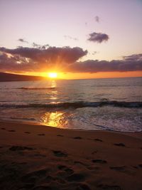 Scenic view of sea against sky during sunset