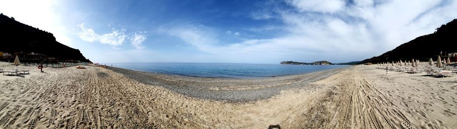 Panoramic view of beach against sky