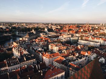 Aerial view of townscape against sky