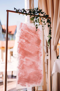 Close-up of clothes hanging at home