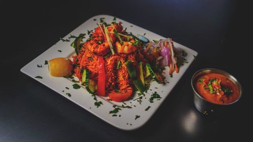 High angle view of serving food in plate