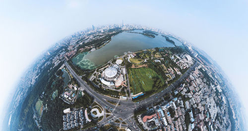 Digital composite image of buildings against sky