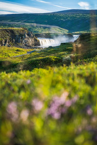 Scenic view of land against sky