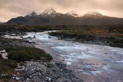 Scenic view of rocky mountains against sky