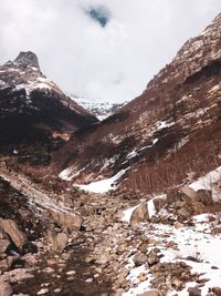 Scenic view of snowcapped mountains against sky