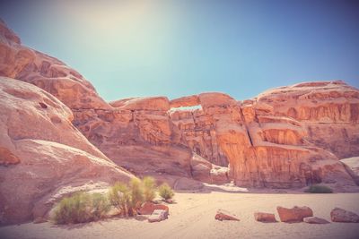 Rock formations in desert against sky