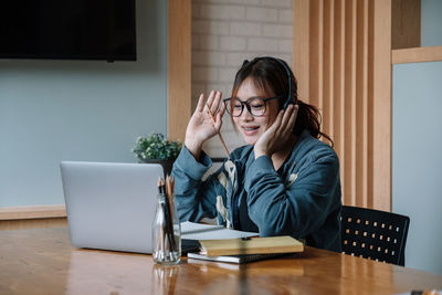 Freelancer doing video call on laptop