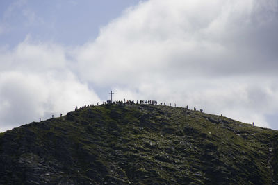 Crowded summit of carrauntoohil, ireland's highest mountain