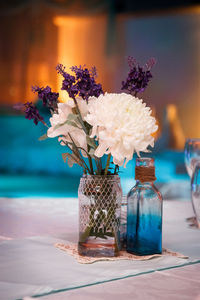 Close-up of flowers in vase on table