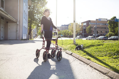 Woman using mobility walker
