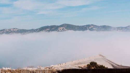 Scenic view of mountains against sky during winter