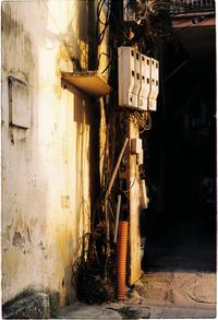 Abandoned alley amidst buildings in city