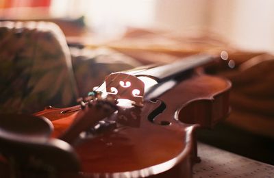 Close-up of guitar on table