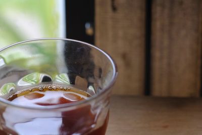 Close-up of ice tea on table