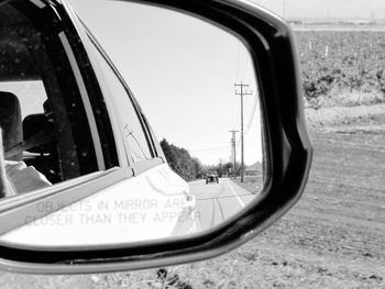 Close-up of car on side-view mirror