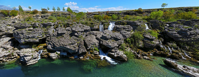 Scenic view of river against sky