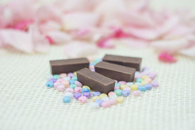 Close-up of chocolates on fabric