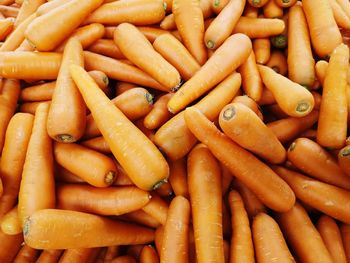 Full frame shot of carrots for sale at market