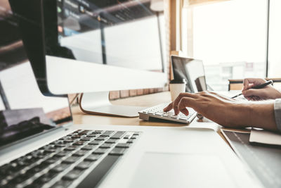 Man using laptop on table