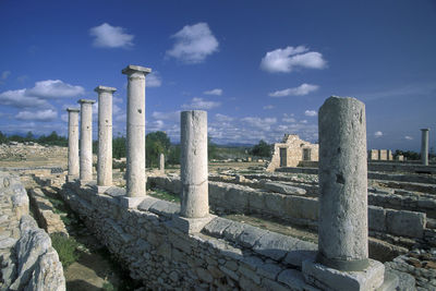 Ruins of historical building against sky