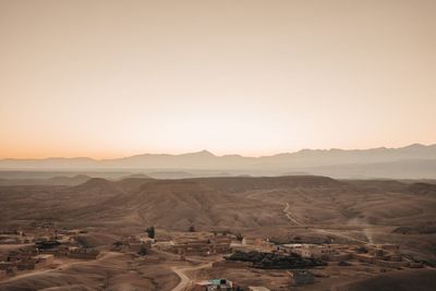 High angle view of desert against sky during sunset