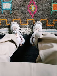 Low section of people standing on floor