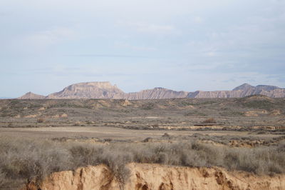 View of landscape against cloudy sky