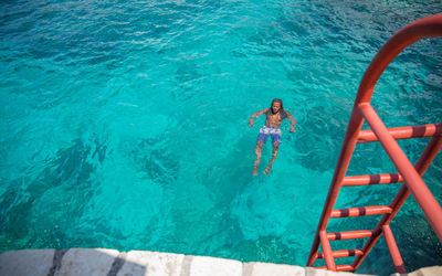 High angle view of man in swimming pool