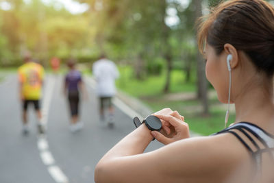 Portrait of woman using mobile phone