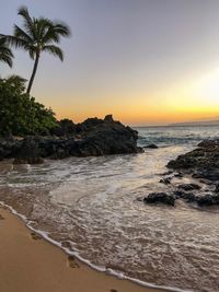 Scenic view of sea against sky during sunset