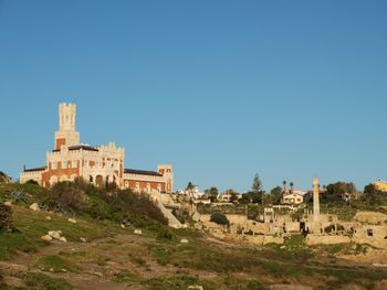 Historic building against clear blue sky