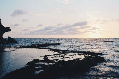 Scenic view of sea against sky during sunset