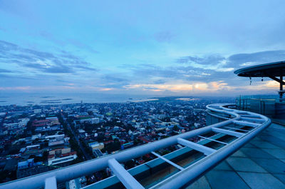 High angle view of city buildings against sky