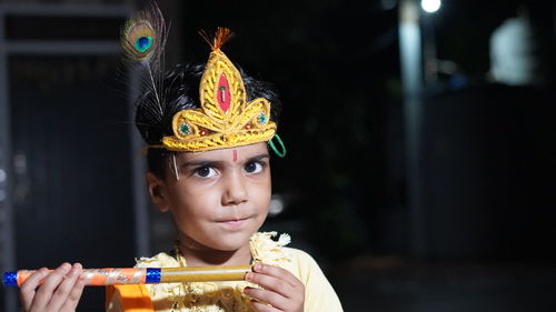Child dressed as lord sri krishna on the janmashtami festival or ashtamirohini day for the processio