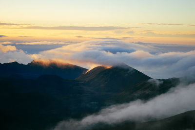 Haleakala crater against sky during sunset