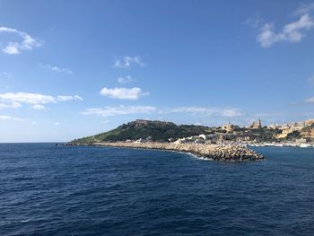 Scenic view of sea and blue sky