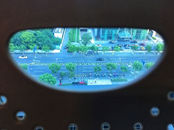 View of airplane seen through window