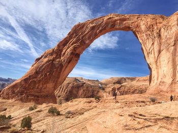 Scenic view of mountain against cloudy sky