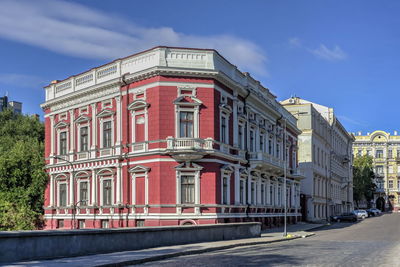 Buildings in city against sky