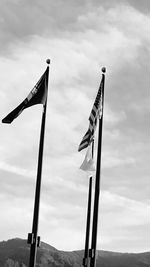 Low angle view of flag against sky