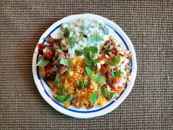 High angle view of salad in bowl on table