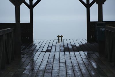 Rear view of person standing against sky