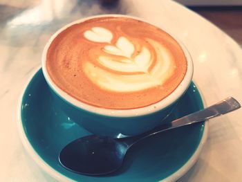 High angle view of cappuccino on table