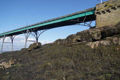 Low angle view of bridge against clear sky